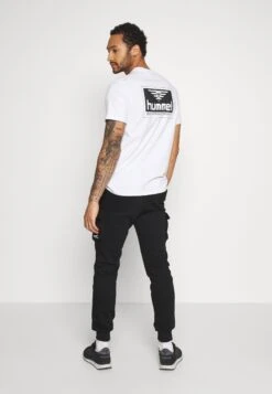 YOURTURN UnisexPantaloni SportiviBlack Donna Pantaloni YO121001T-Q11 -Yourturn 37e11c7cc85b4c32935b63421ffc599f scaled